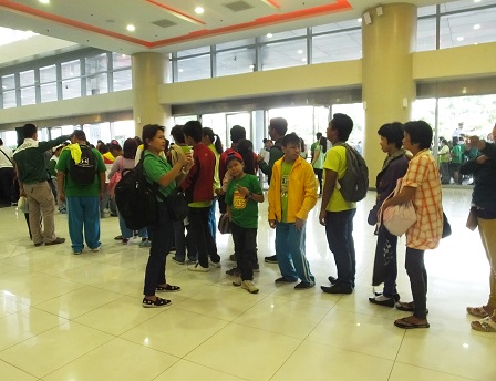Participants queue up early in the morning at the lobby