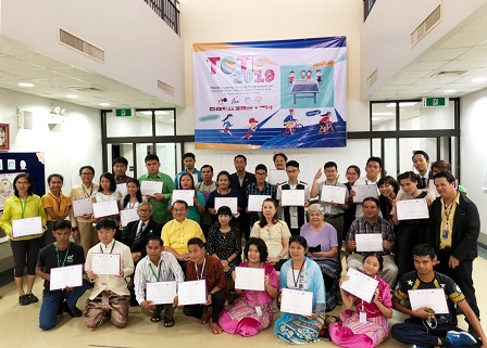 Group photo of participants with their certificates at the closing ceremonies