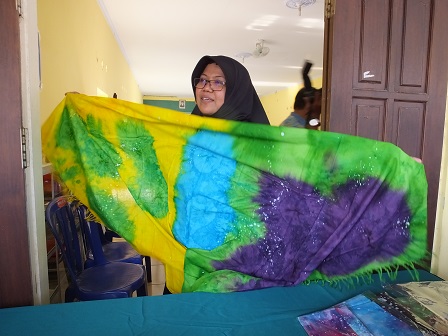 Magetan resident proudly displays locally-designed batik fabric
