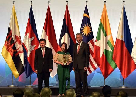 Ms. Koe, who is also Chair Emeritus of Autism Society Philippines, with Singapore's Prime Minister Lee Hsien Loong and ASEAN Secretary General Dato Lim Jock Hoi at the opening ceremony of the 33rd ASEAN Summit in Singapore