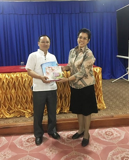 Presentation of APCD publications by ASEAN Hometown Improvement Project Manager Mrs. Jitkasem Tantasiri