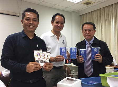 60+ Plus Bakery & Cafe Project Manager Mr. Sunthorn Nowarat with Mr. Piroon and Mr. Carolus presenting 60+ Plus Chocolatier by MarkRin chocolate bars
