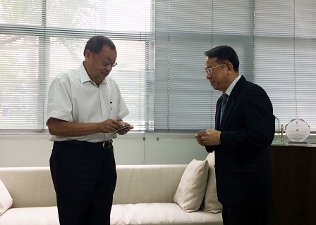 Exchanging business cards during the courtesy call