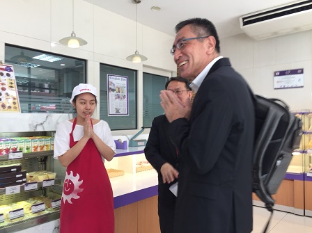 Mr. Masami greeting the staff at 60+ Plus Bakery & Cafe