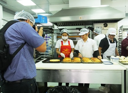 Photo shoot of bakery staff at work