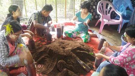 Shwe Min Tha Foundation (SMTF) mushroom farm staff engaged in mushroom spore culture