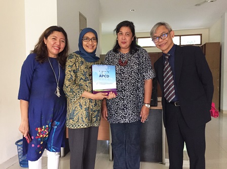 Presenting the Yayasan Autisma Indonesia staff with APCD publications