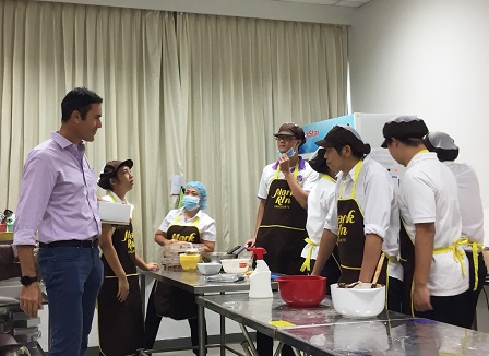 Mr. Farina talks with 60+ Plus Chocolatier by MarkRin trainees with diverse disabilities