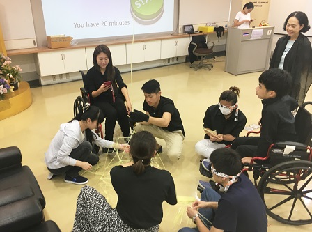 Students taking part in inclusive team-building exercises
