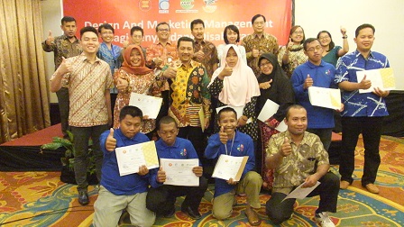 Participants with their certificates of completion and appreciation