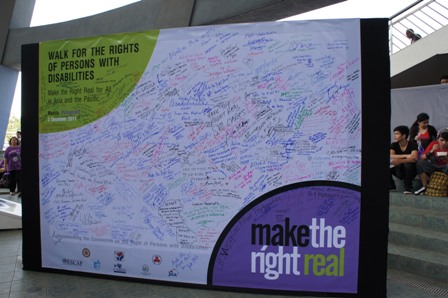 Participants Signing the Pledge Board