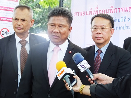 Gen. Surasak, with Mr. Somkid and Mr. Piroon, being interviewed by the media
