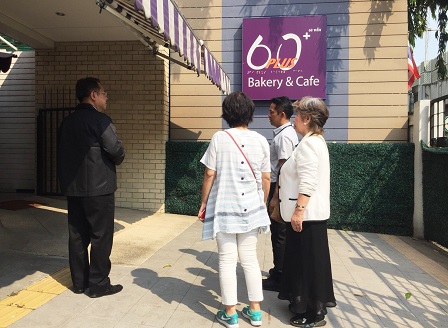 The visitors having a tour of 60 Plus+ Bakery & Cafe premises