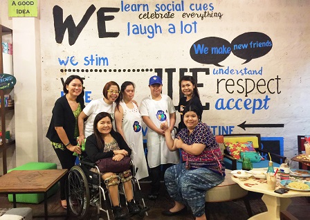 Photo with the staff with autism of the Puzzle Gourmet Store & Cafe