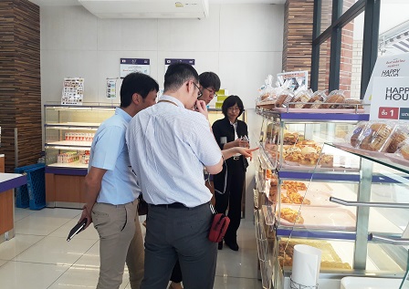 Visitors taking a look at 60 Plus+ Bakery & Cafe products
