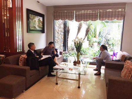 APCD Project Manager Ms. Jitkasem Tantasiri and Disability-Inclusive Business Chief Ms. Duangkamol Thongmung discuss Project details with technical review consultant and midterm evaluator Associate Prof. Dr. Watcharapong Wattanakul