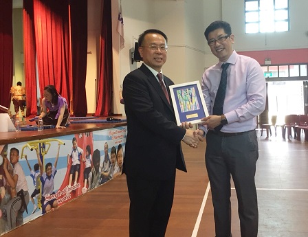 Token of appreciation to Mr. Piroon from Mr. Matthew Ou (Principal, Towner Gardens School, MINDS)