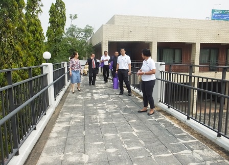 Trying out the accessible bridge and ramp connecting the APCD Training Building to its main office building
