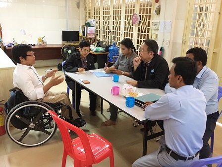 APCD team with officials and members of the Phnom Penh Center for Independent Living (PPCIL)