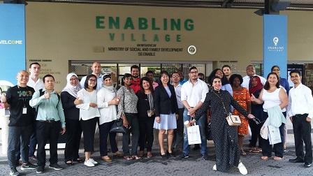 Group photo with participants at Enabling Village