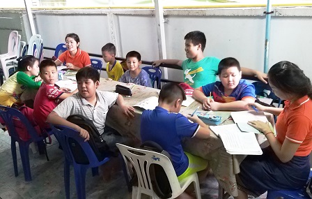 Children with autism having tutorials at the Lao Autism Association (LAA) office