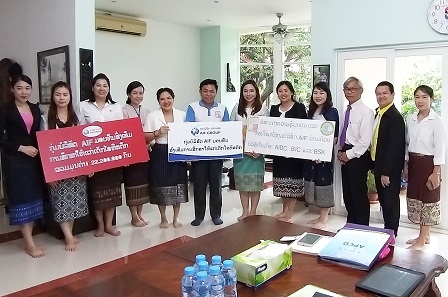 Group photo with APCD and Ms. Kingphongeun Phoummasack (President, AIF Group) with her staff during a donation ceremony at LAA in to support and promote education of youth with autism