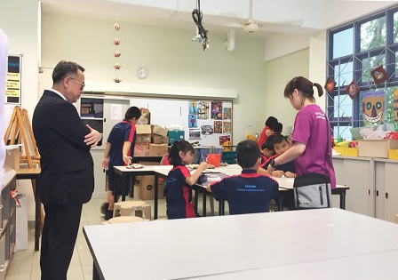 Mr. Piroon observing a special class at MINDS' Towner Gardens School