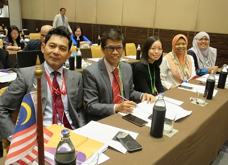 Malaysian participants pose for a photo