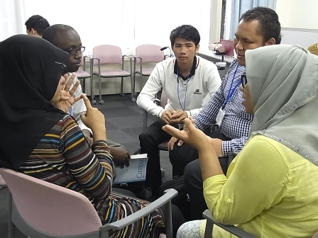 Participants in a role-playing activity about abuse prevention