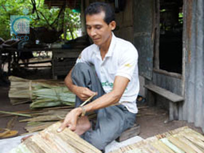 Farmer with Disabilities Making Palm Leave Roof