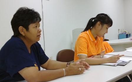 Participants discussing various meeting agendas