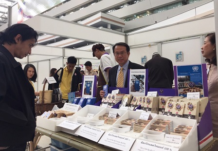 Mr. Piroon at the APCD's 60+ Plus Chocolate Project booth