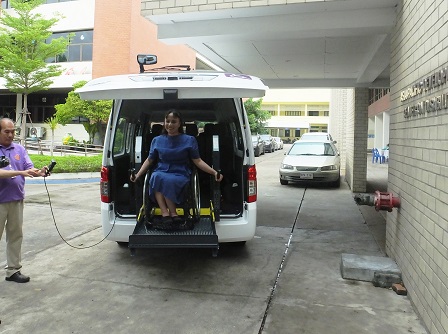 Demonstration of the donated Nissan van's accessible lift for persons with disabilities   