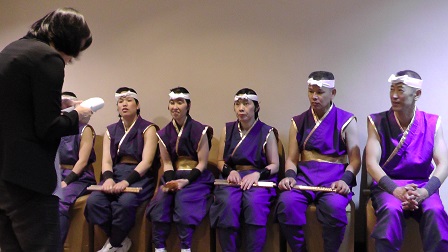 Japan's Fugaku Taiko drum performers with intellectual disability being interviewed by the media