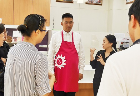 Interaction with a staff with disability at the 60 Plus+ Bakery and Cafe
