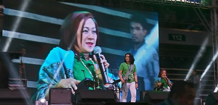 National Council on Disability Affairs Officer-in-Charge Ms. Carmen Reyes-Zubiaga giving a speech