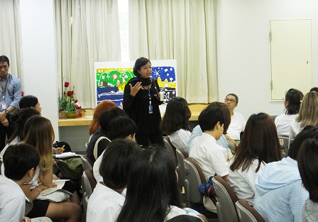 APCD's Information and Knowledge Management manager explaining about the 60 Plus+ Bakery and Cafe 