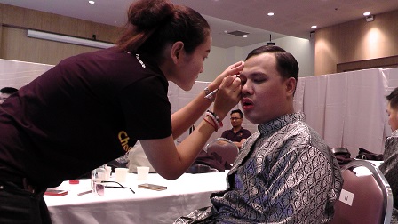 Thai drum performers with autism preparing backstage