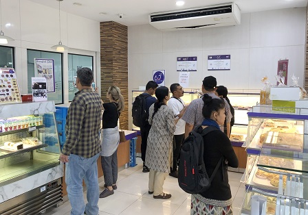 APCD 60+ Plus for All Project Manager Mr. SUnthorn Nowarat introduces participants to the 60+ Plus Bakery & Cafe and 60+ Chocolatier projects