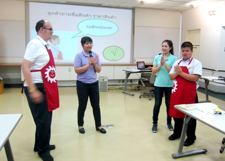 Trainees being taught how to greet customers