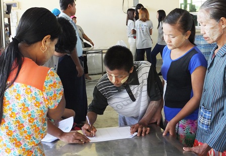 Boy with autism registering for the Games
