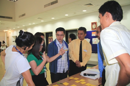 Participants discussing various disabilities in a Disability Equality Training (DET) activity