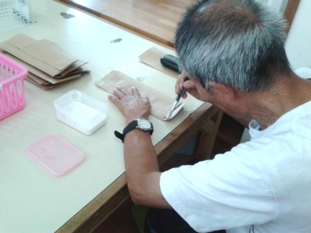 A senior citizen being given employment opportunity in Okinawa