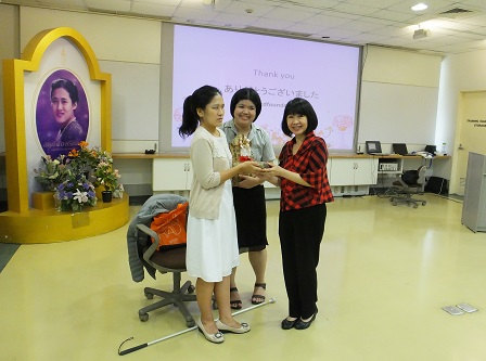 A token of appreciation from Ms. Amporn Benjaponpithak, Director of Rajanukul Institute