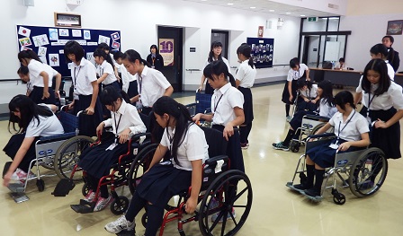 Students learning how to use wheelchair