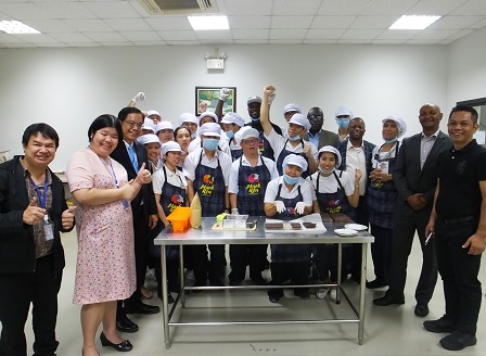 Group photo with 60 Plus+ Bakery & Cafe trainees with diverse disabilities